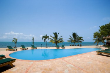 Belizean Dreams, situated on the Caribbean Coast of Southern 
Belize, this superb enclave of 9 luxurious, three bedroom, three bathroom, beachfront private vacation villas is ideal for adventurers who dream of a holidays 
coastal retreat in the heart of a lush tropical haven. If youre a coastal enthusiast seeking an adventure vacation, Belizean Dreams provides an excellent 
return to nature.