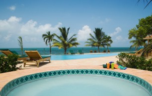 Belizean Dreams, situated on the Caribbean Coast of Southern 
Belize, this superb enclave of 9 luxurious, three bedroom, three bathroom, beachfront private vacation villas is ideal for adventurers who dream of a holidays 
coastal retreat in the heart of a lush tropical haven. If youre a coastal enthusiast seeking an adventure vacation, Belizean Dreams provides an excellent 
return to nature.