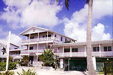 The San Pedro Holiday Hotel, is an attractive, colonial-style, three storey hotel located right on the beach in the heart of San Pedro, Ambergris Caye, Belize, overlooking the Caribbean and the Belize Barrier Reef which is only half a mile offshore.