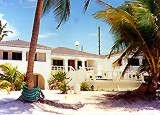 A private beachfront villa for vacation rental in San Pedro on the tropical island of Ambergris Caye, Belize