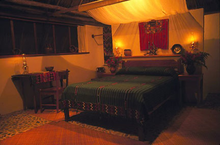 Pook's Hill Lodge, a beautiful, remote jungle lodge of comfortable thatched roof cabanas set in prime rainforest in Western Belize participating in ecotourism.and offering easy access to the Mayan cities in Belize and the tropical jungle in Belize.