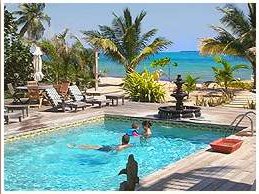 Inn at Robert's Grove, situated on
a perfect beach on the Placencia peninsula of Belize. Luxurious 
accommodations and facilities, the ideal choice for a tropical vacation